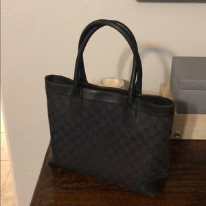 Gucci purse. Authentic. GG fabric,leather straps.